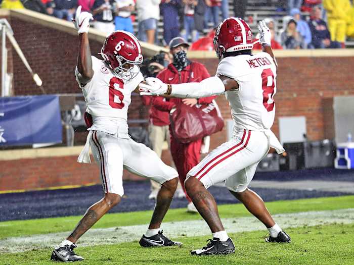 Alabama receivers DeVonta Smith and John Metchie III celebrate a touchdown